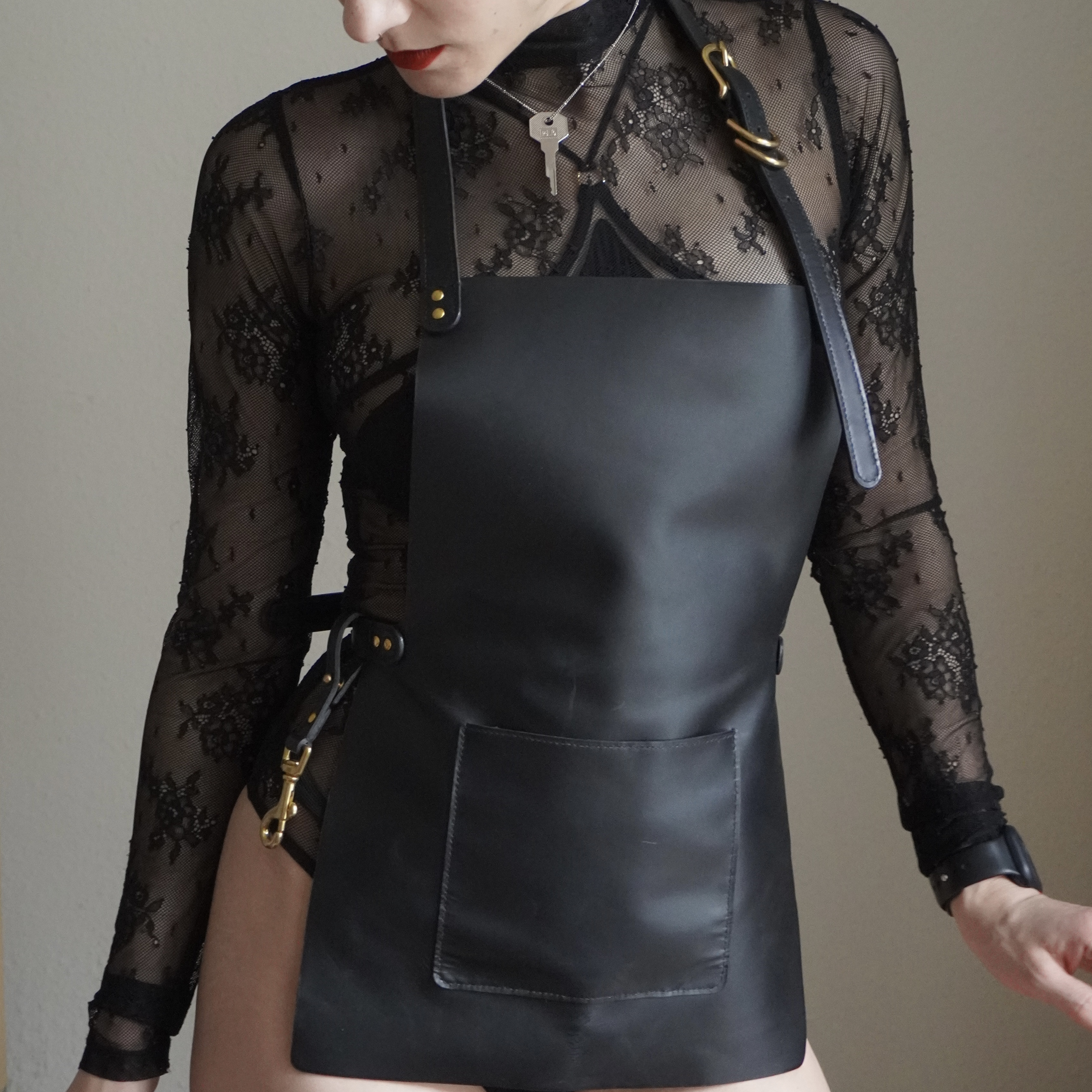 Dominatrix apron closeup front Dominatrix apron closeup front